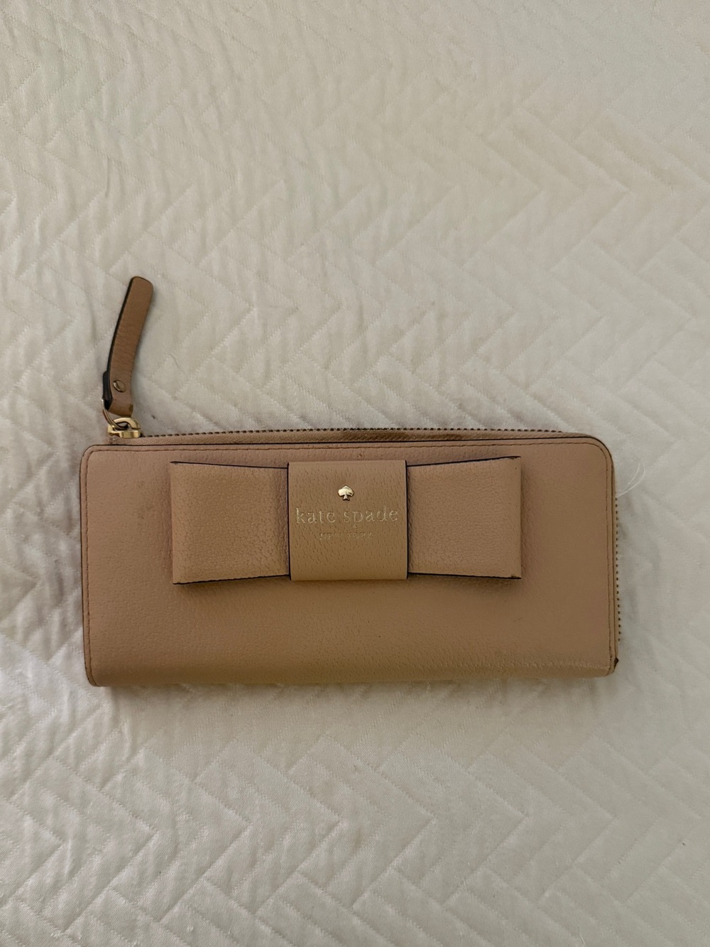 kate spade bow zip-around leather wallet light pink